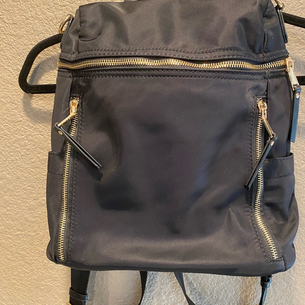 Stylish Black Backpack with Gold Accents